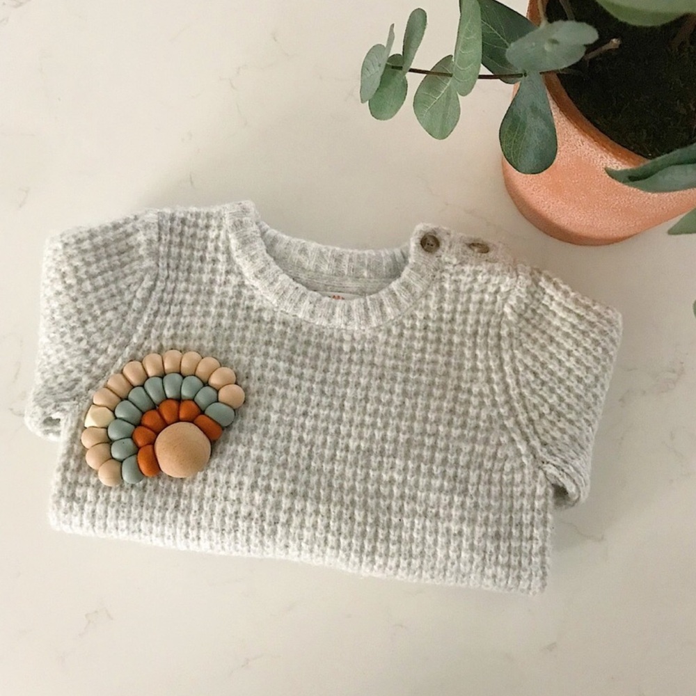 Knit sweater onesie